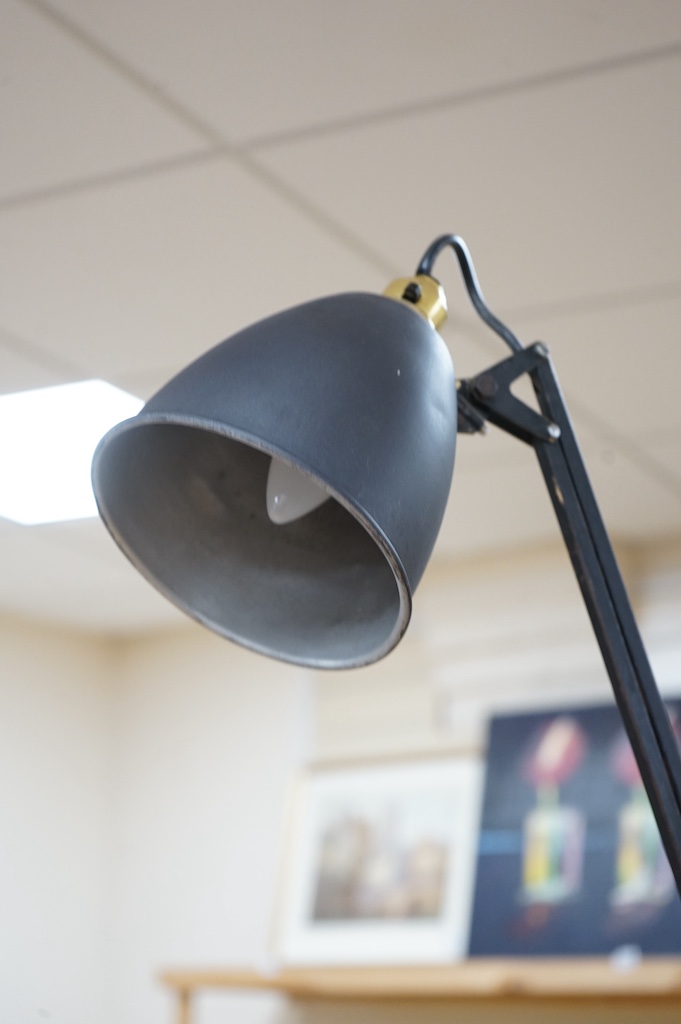 A mid century architect's black metal angle poise desk lamp, 110cm high. Condition - fair to good, not tested